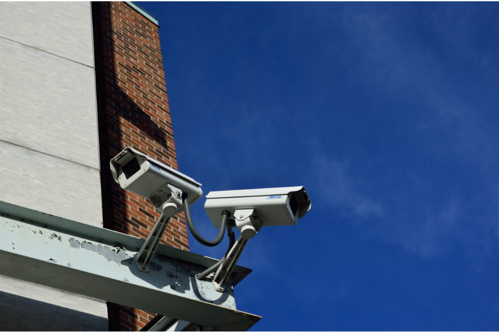 Outdoor CCTV security cameras monitoring a commercial building